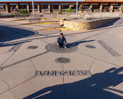 Ace Sitting on the Four Corners, Four Corners Monument, United States